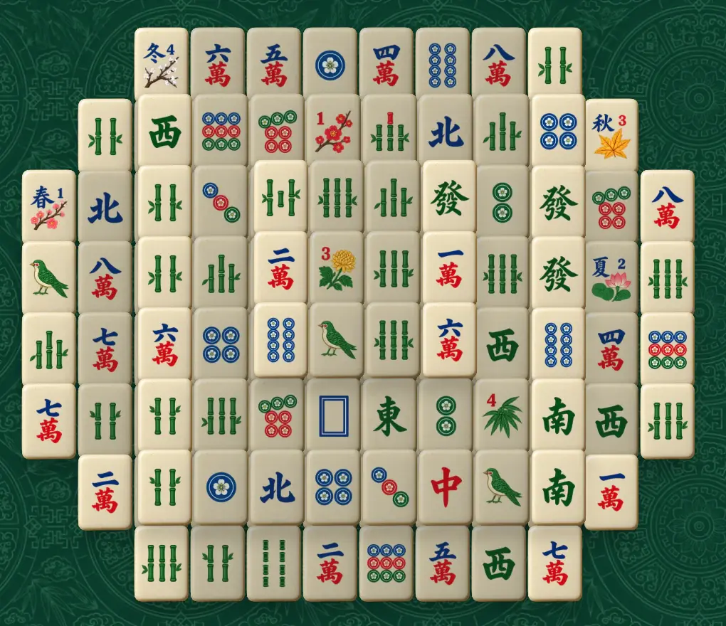 Hrací plocha Mahjong Solitaire s kameny v barvě slonové kosti a čínskými symboly v několika vrstvách